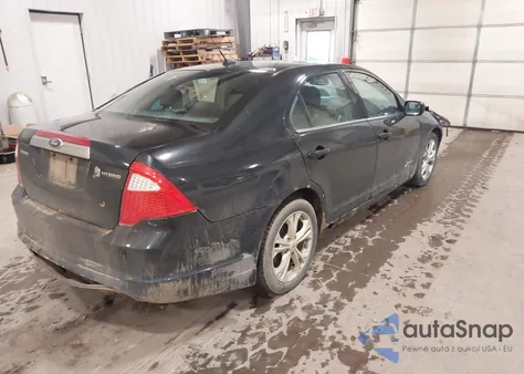 2012 Ford Fusion Hybrid из США, поврежденный, VIN 3FADP0L39CR431563